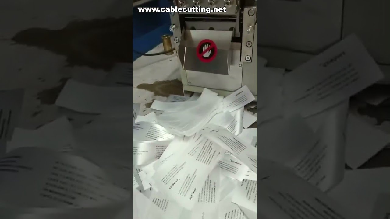 Machine de découpe et scellage de bords pour étiquettes tissées, sangles et ceintures élastiques