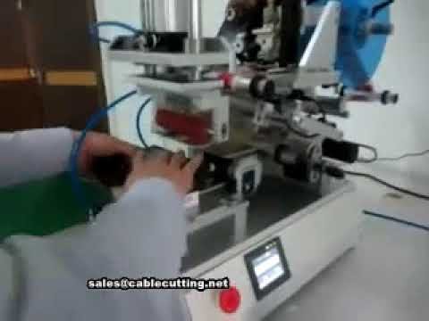 Machine d'étiquetage automatique pour bouteilles rondes et plates
